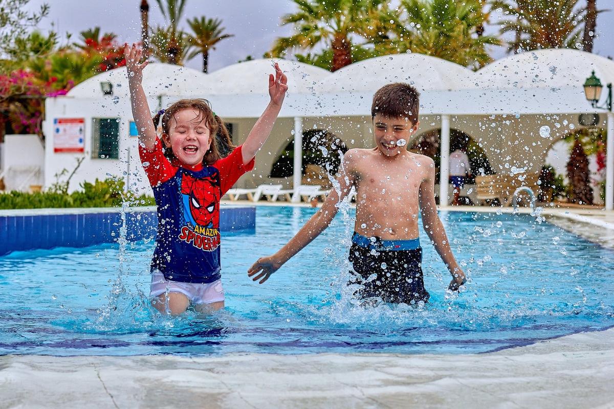 Child enjoying a calm swimming lesson
