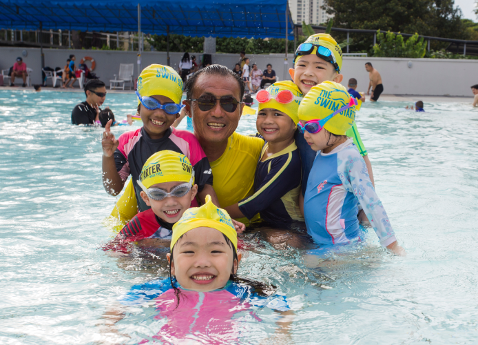 The Swim Starter coach with kids attending a swimming lesson
